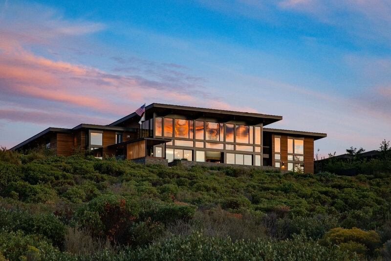 modern-mountain-house-exterior-wood-black-steel-sunset