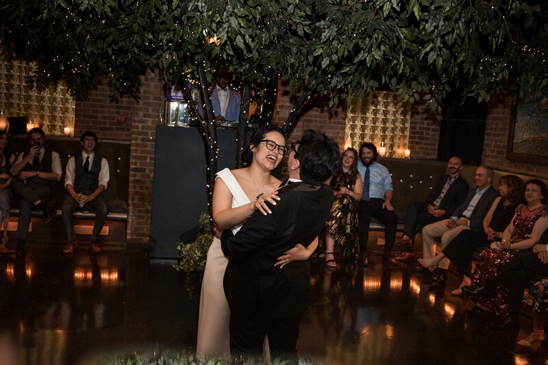 bride and groom enjoying their  first dance as husband and wife at the Lounge in brooklyn's Deity venue.