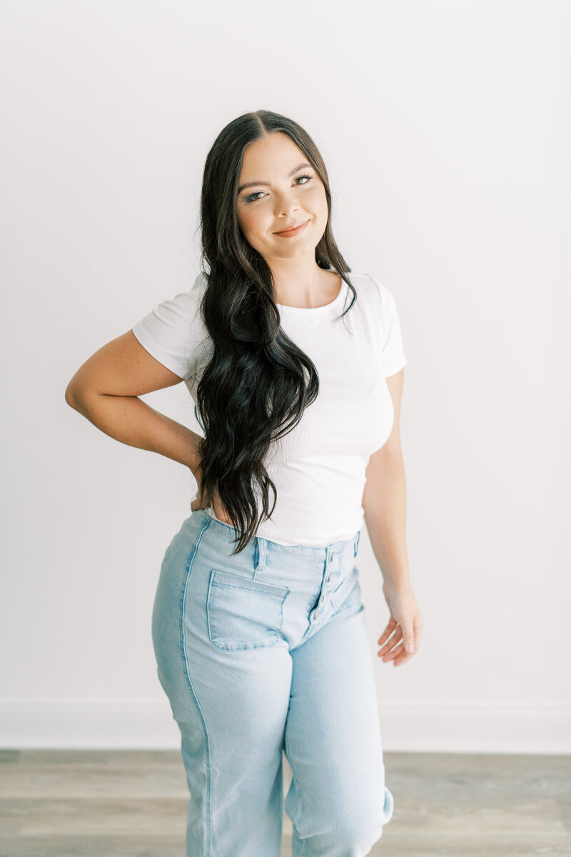 headshot of woman with dark brown hair, owner of kentucky heirlooms photography.