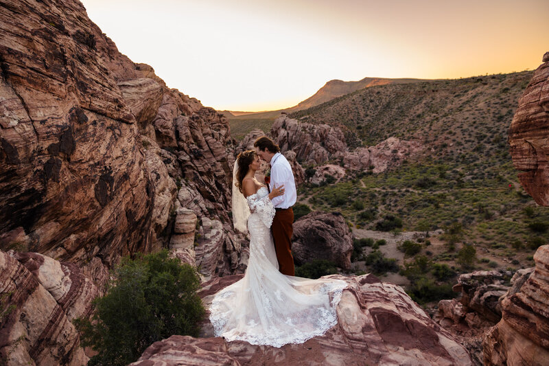 couple kissing on beach in rocky point
