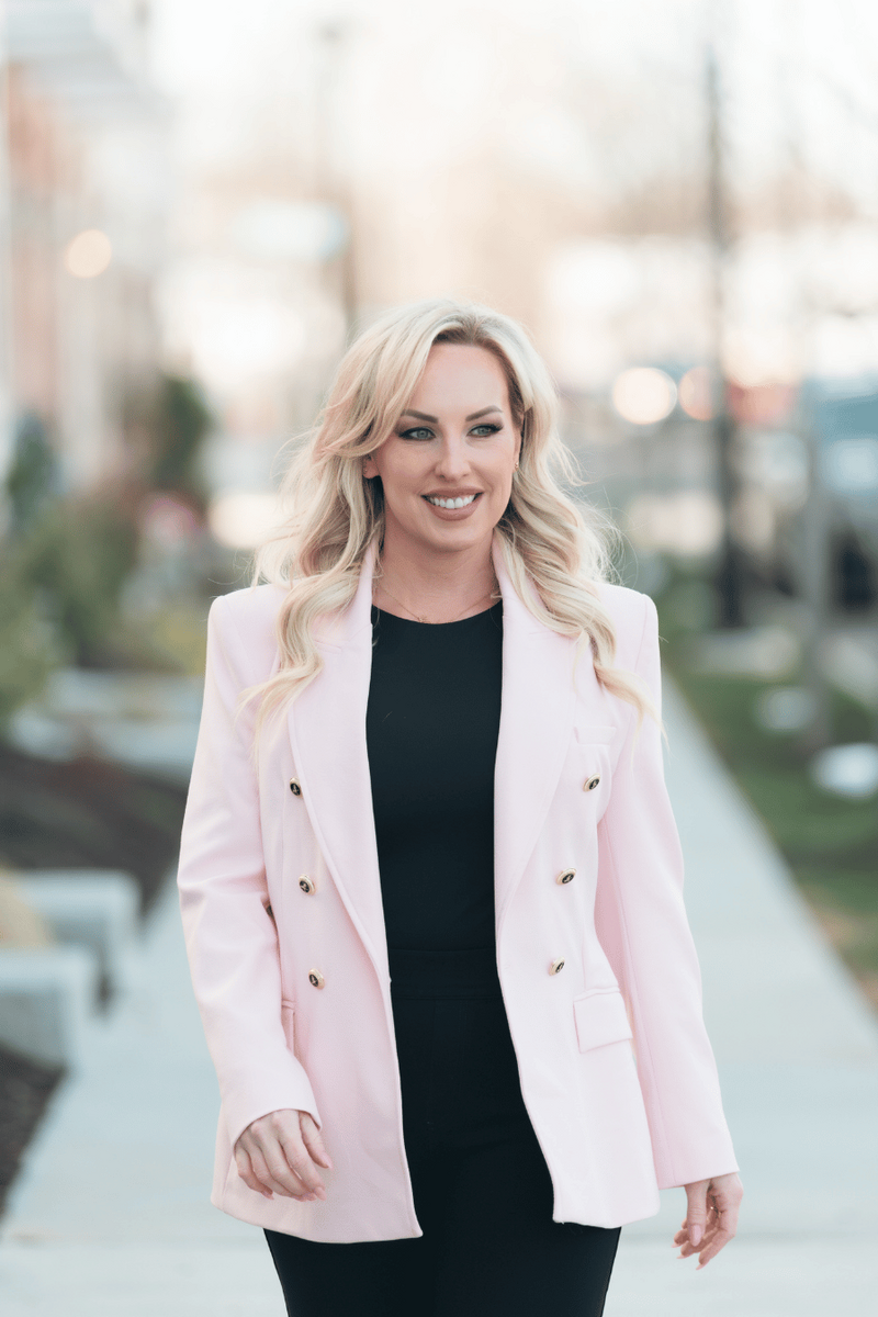 Becky Bostic hosting a segment of American Dream TV showcasing luxury real estate in Bucks County.