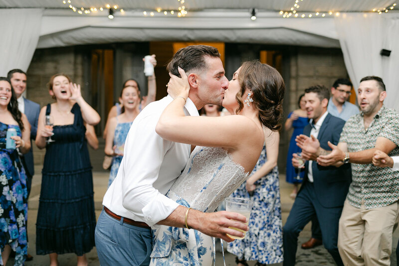 bride-groom-kiss-reception