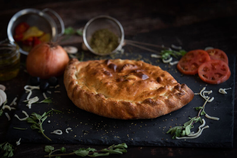 Golden-baked Redo’s panzerotti with hand-crimped crust—classic comfort food made fresh in Yarmouth and Wolfville