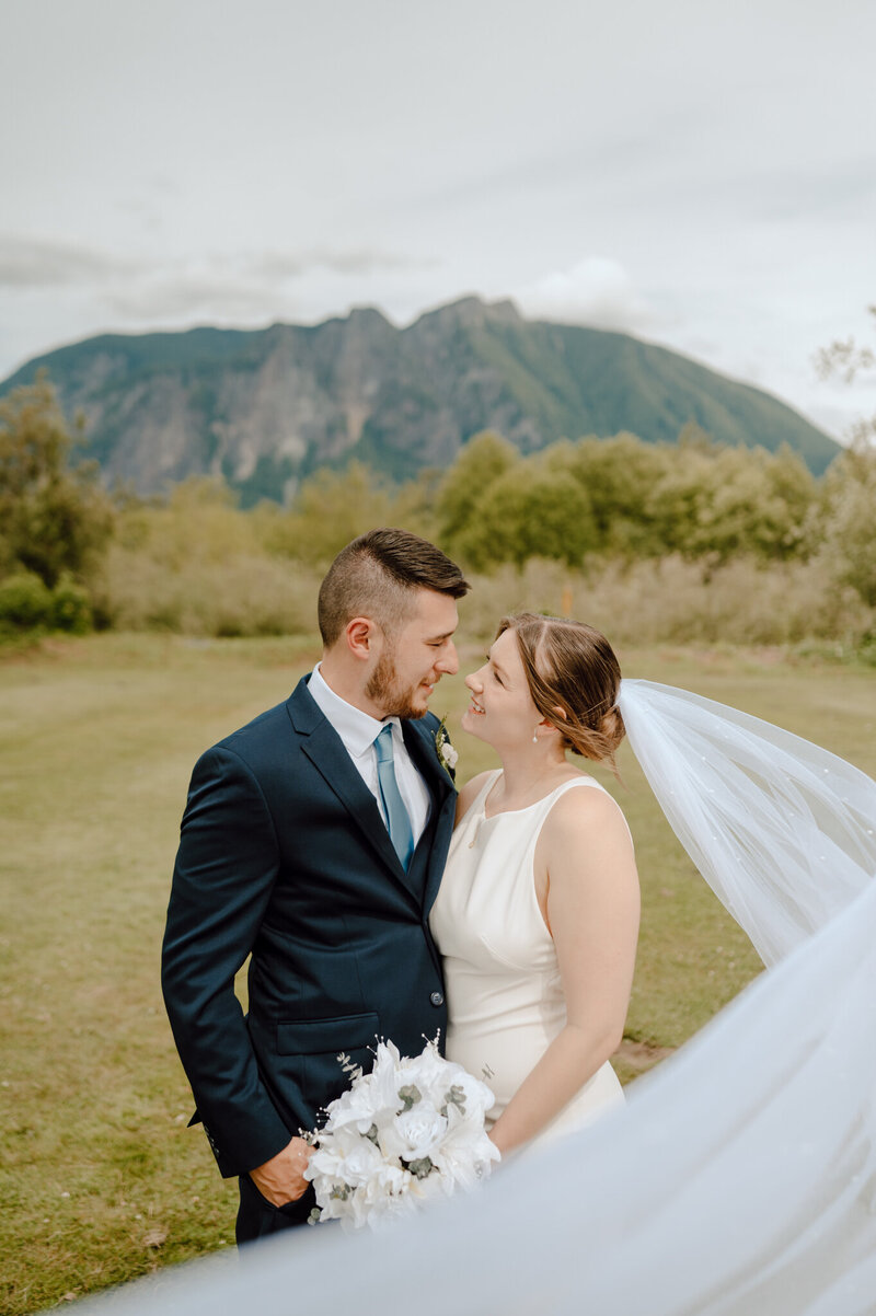 bride and groom holding each other