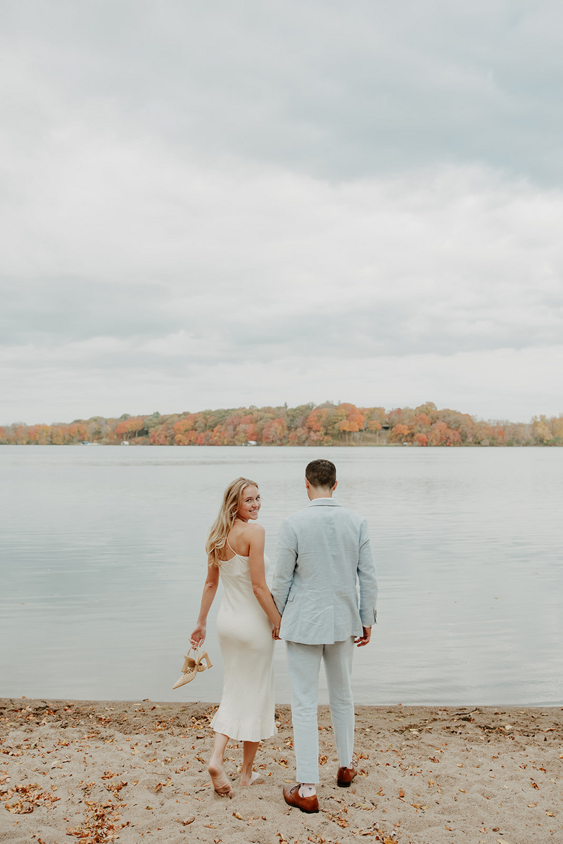 Minnesota wedding photographer capturing playful, true-to-life moments where your love takes the lead. Fun, relaxed, and timeless photography for real couples.