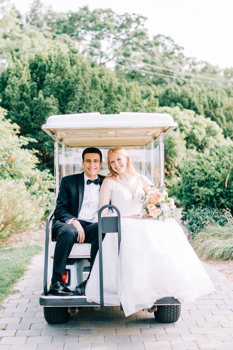 bride and groom on golf cart-0422