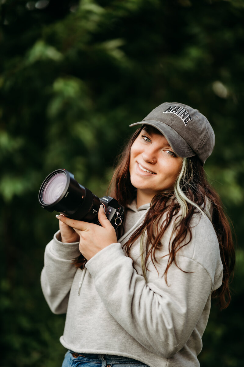 Meet Sydney Brynn, the creative soul capturing Vermont's most authentic moments. Seen here in her element, behind the camera.
