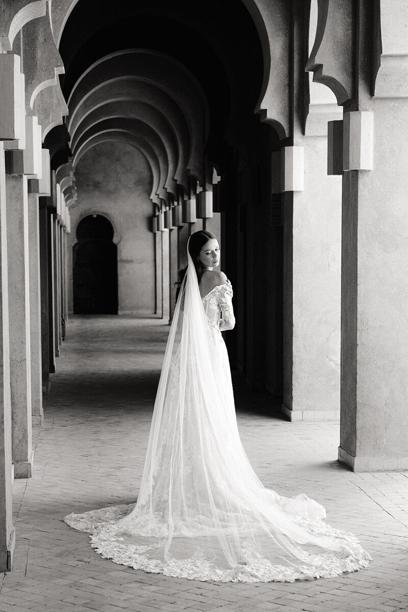 Bride’s veil blowing in Marrakech wind at private villa
