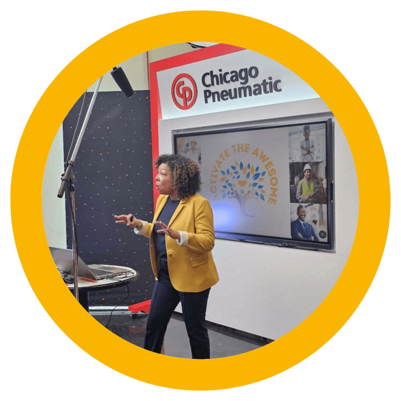 Photo of Michelle McKown-Campbell giving a keynote speak at Chicago Pneumatic