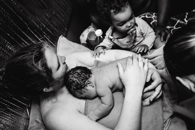 Woman with newborn baby