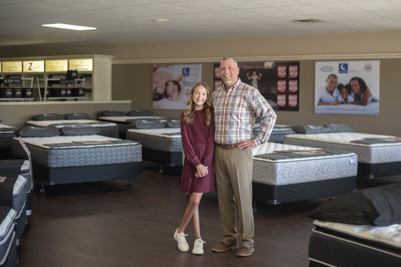 Local small business owner of a mattress store and his daughter