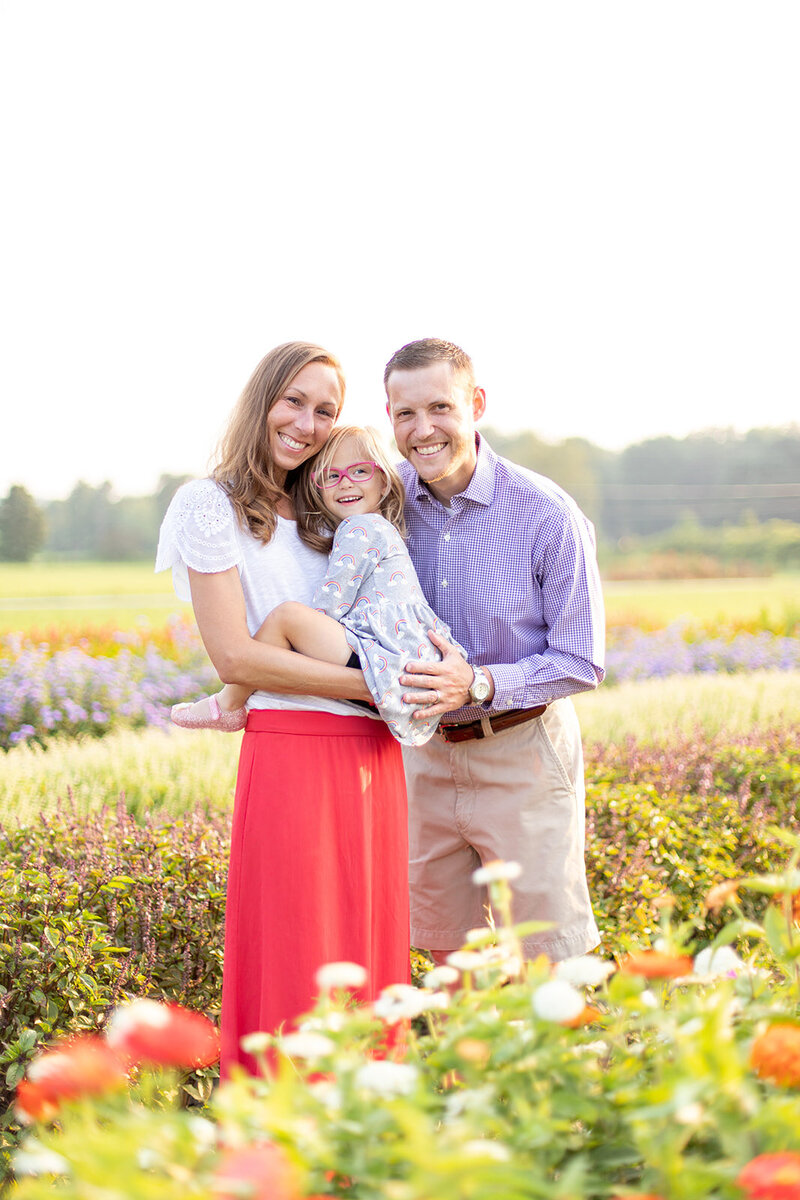 Family in flower field