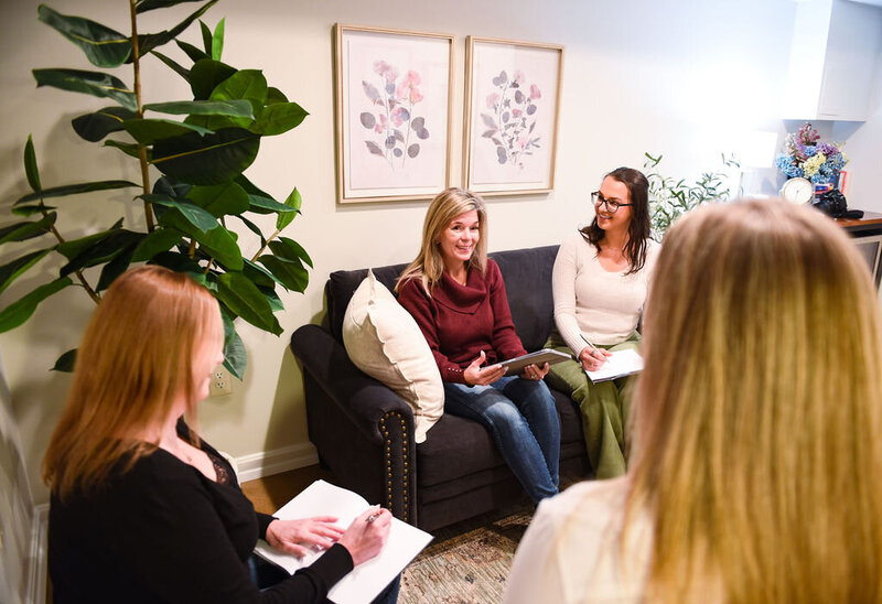Cozy therapy office setup with comfortable seating