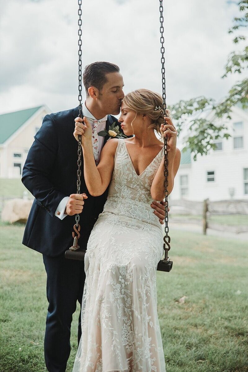 Best New England wedding photographer, Love, Jackie Weddings captures couple on a swing