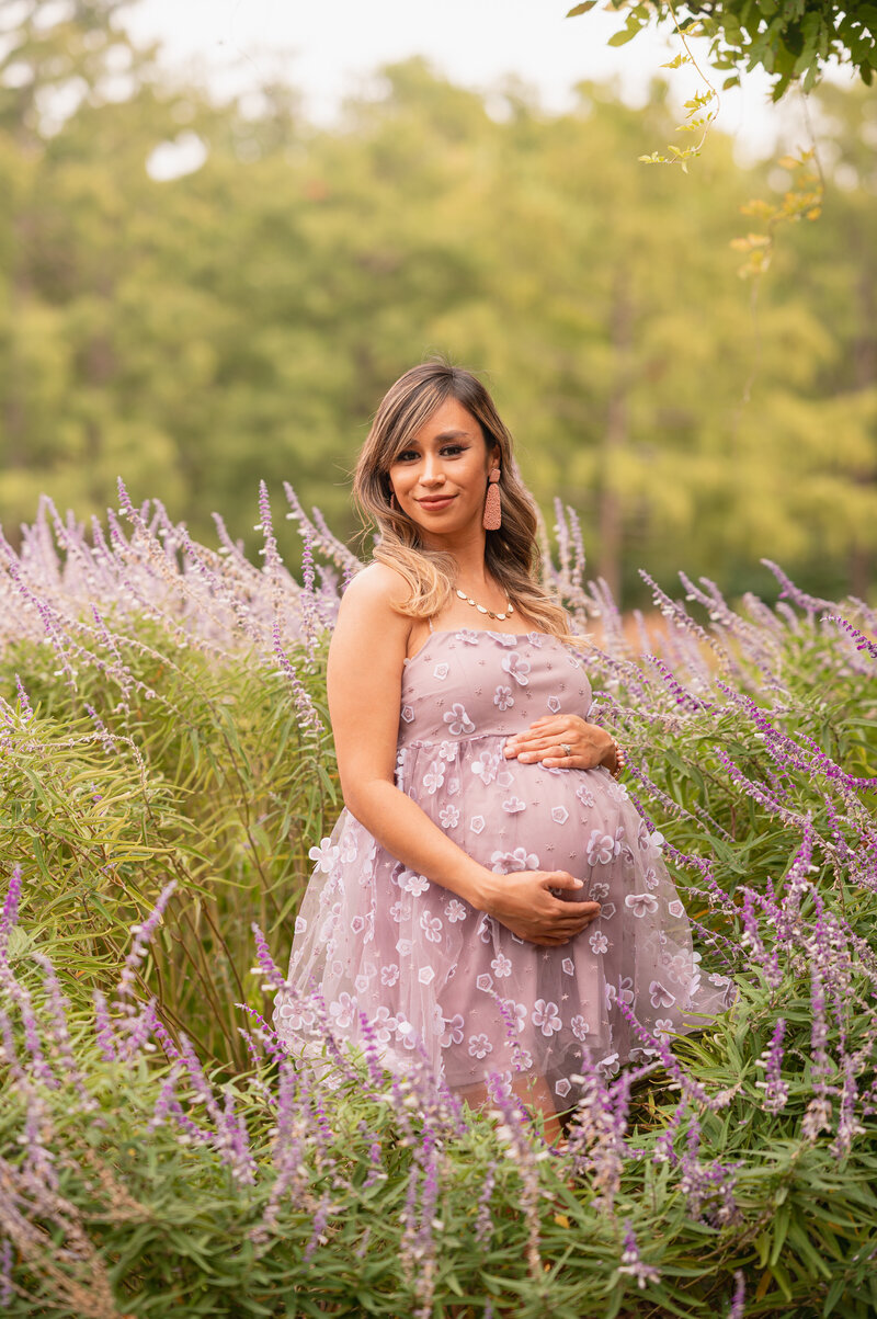Expecting mother standing in a lavender field during golden hour — elegant maternity photography in Fort Worth by Poppy + Blue Photography