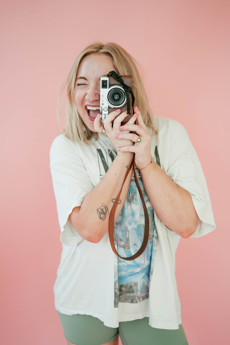 Taylor grater smiling in the studio