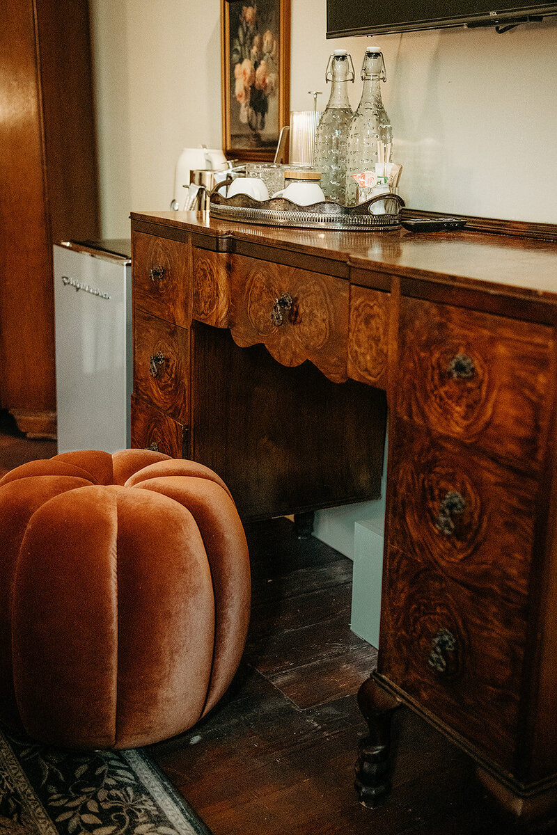 Antique vnaity and drink station in The Little Blanco Suite