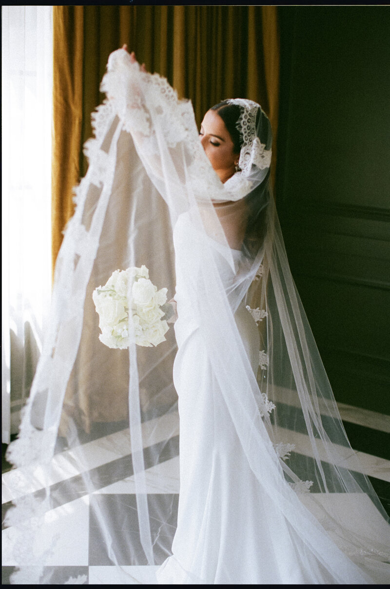 The bride dazzles in a handmade dress by Katrina Tuttle at this intimate backyard wedding in Halifax, Nova Scotia. Captured by Alyssa Joy Photography, the celebration is filled with personal touches and rustic elegance. The charming backyard setting, adorned with delicate floral arrangements and fairy lights, creates a cozy and romantic atmosphere. The bride’s bespoke dress perfectly complements the intimate and heartfelt nature of the event. Keywords: handmade wedding dress, Katrina Tuttle, intimate wedding, backyard wedding, Halifax Nova Scotia wedding, Alyssa Joy Photography, rustic wedding, personalized wedding details.