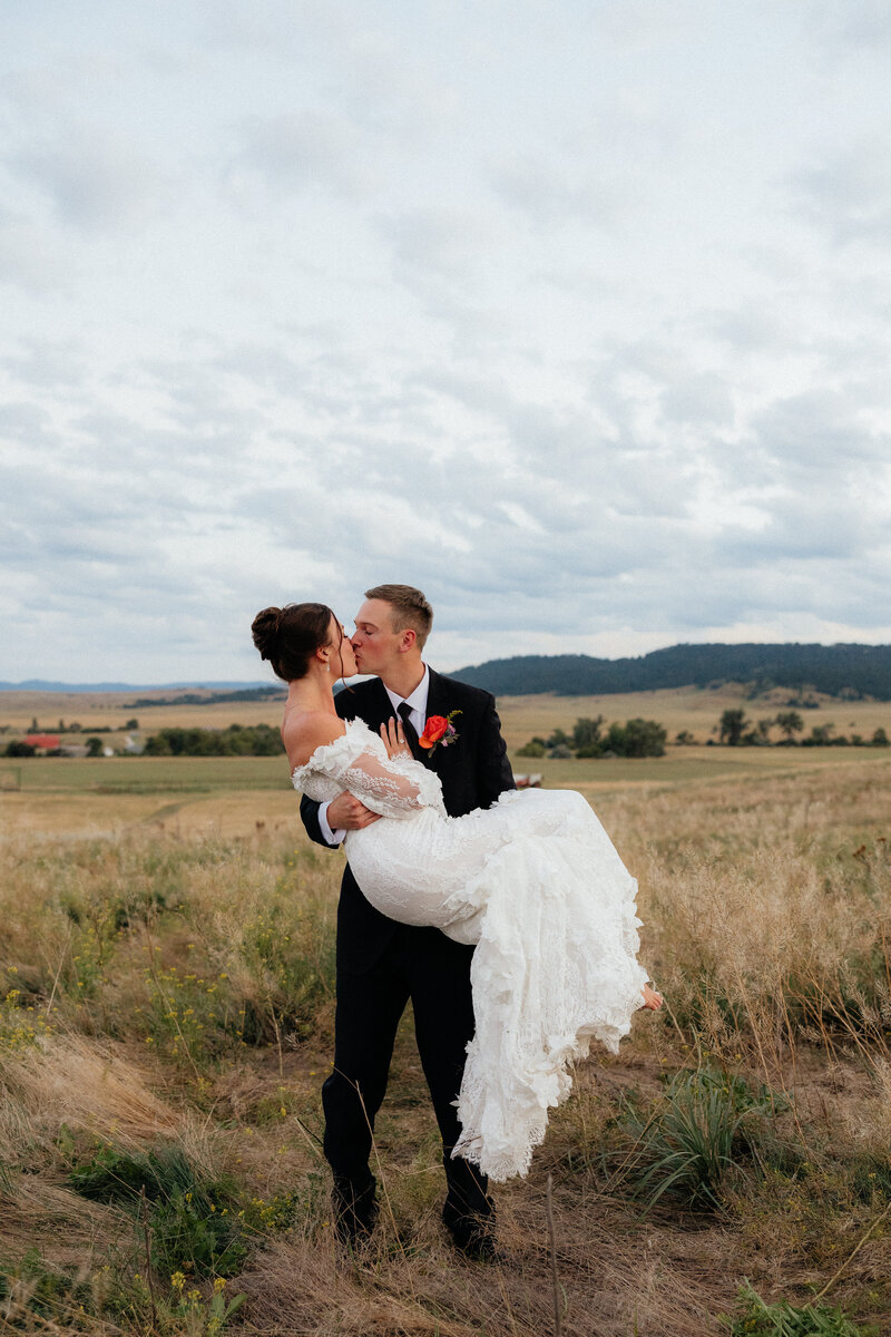 Picture of wedding florals on a barrel.