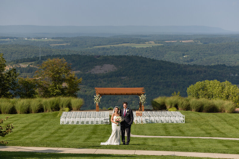 Wedding ceremony at Blue Mountain Resort with stunning views of Lehigh Valley, creating a picturesque backdrop for the couple’s vows.