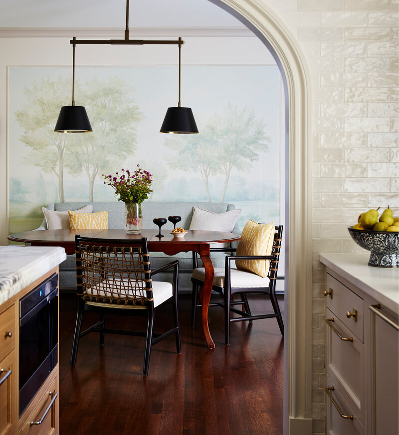 Boston kitchen designer creates a new Milton home kitchen with traditional touches, artisan tile to the ceiling, mural wallpaper, and luxury lighting.