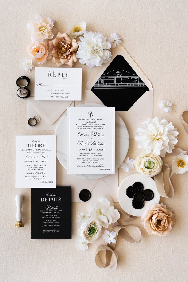 elegant letterpress wedding invitation suite with venue sketch and monogram