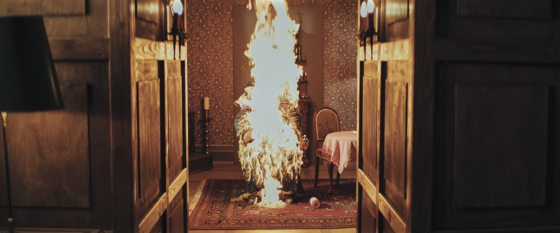 A solitary figure walking in a foggy landscape, evoking themes of loss and revenge.