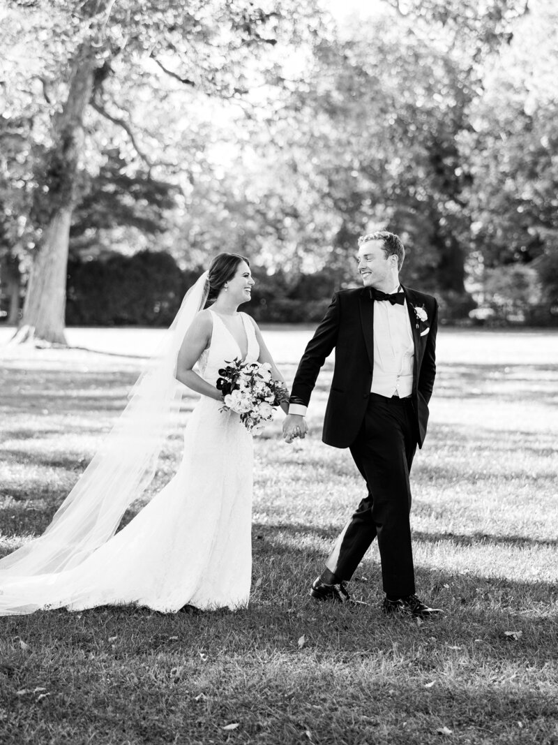 Black and White Bridal Portrait Couple  Walking
