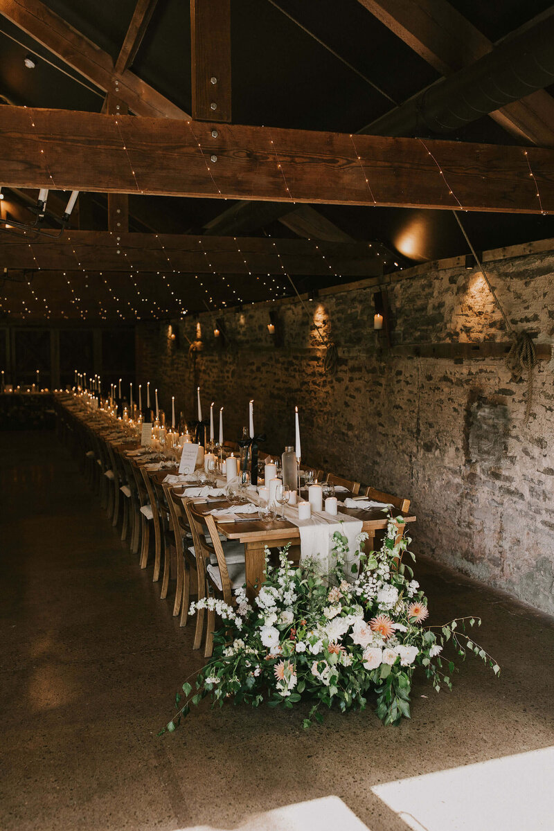 meadows of flowers at long tables at Dewsall Court