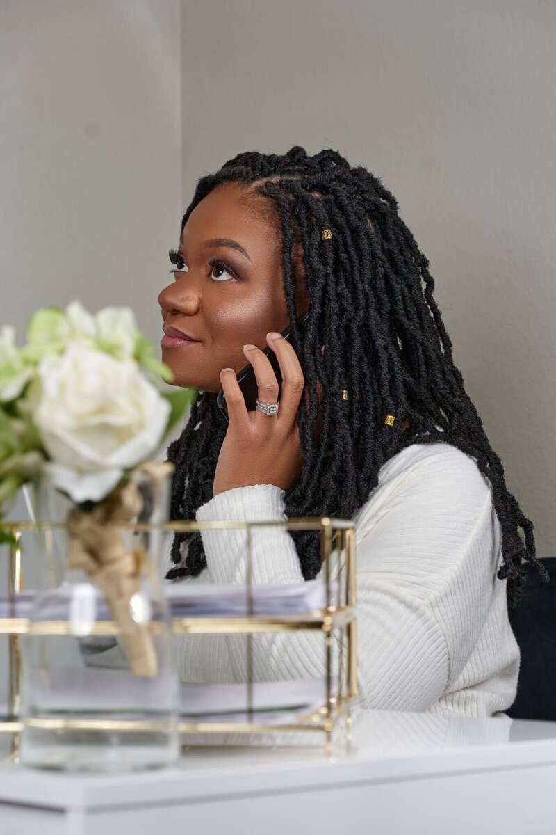Beckie Rose, founder of NorthRose Studio smiling on video call