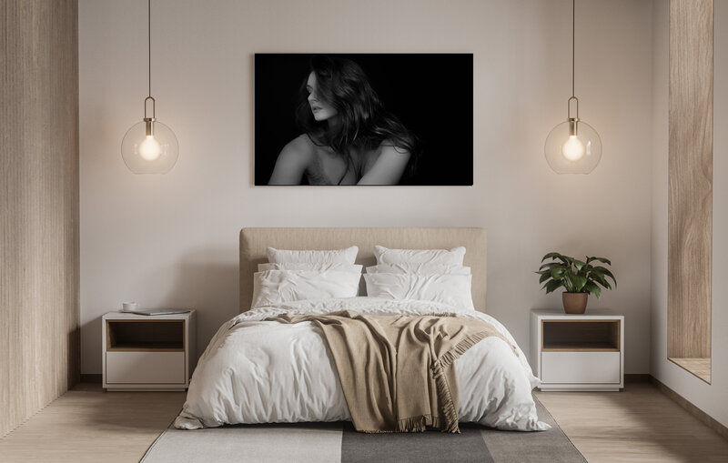 Modern bedroom  in neutral colors with a wall art of a sexy woman on top