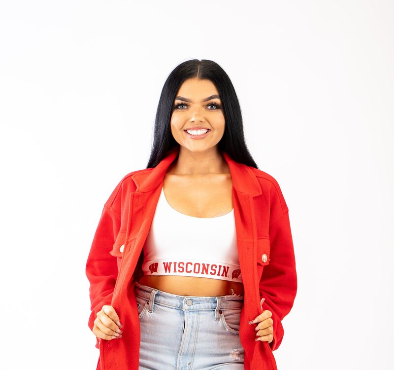 white sports bra with wisconsin on the band