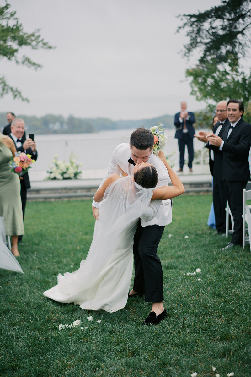 Bride and groom walk up memorial steps at their DC wedding