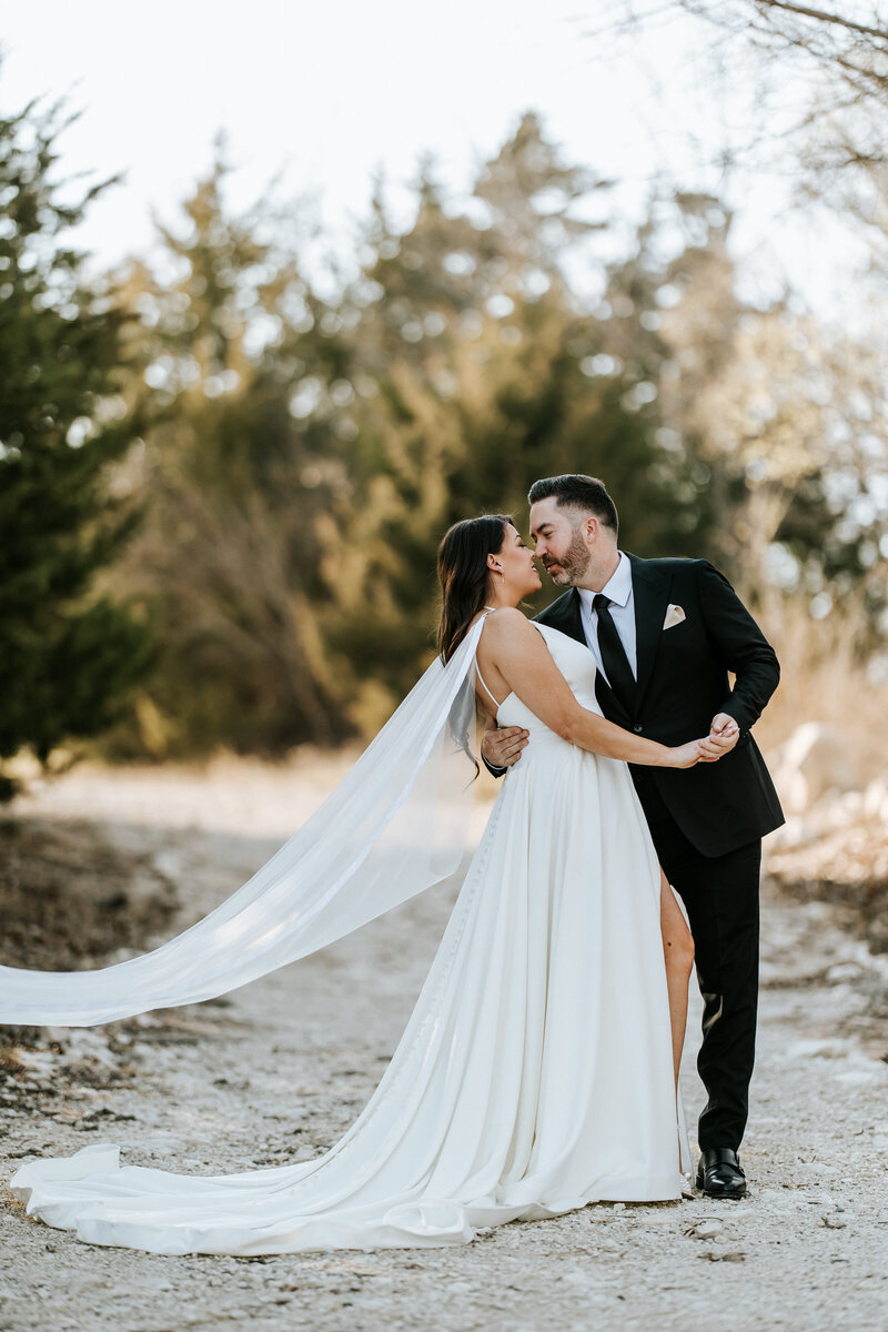Bride and groom embracing