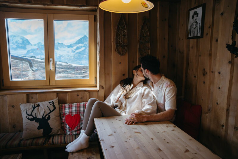 Couple eloping near the Matterhorn mountain, Switzerland, in a mountain hut (hütte)