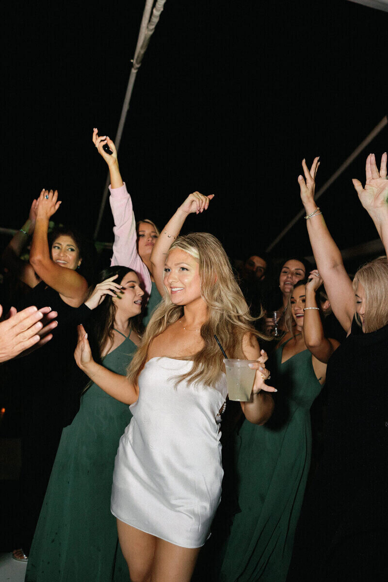 bride with girls dancing by wedding photo tampa