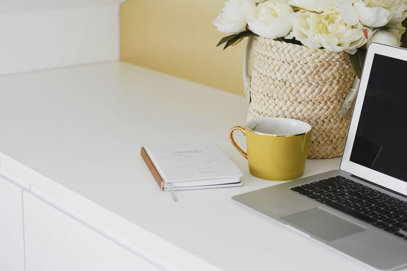 Laptop and mug on desk