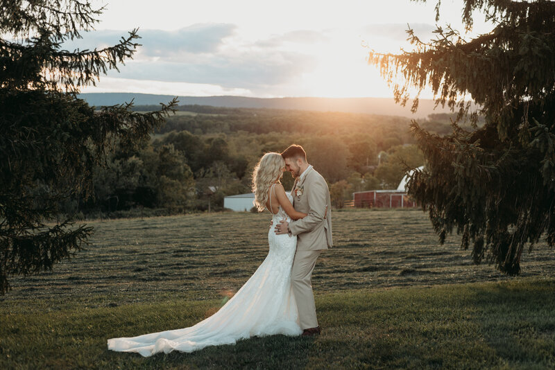 bride and groom walking on grass