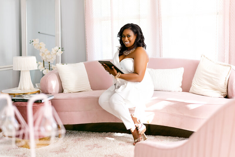 Charlotte NC Event Planner sitting on couch