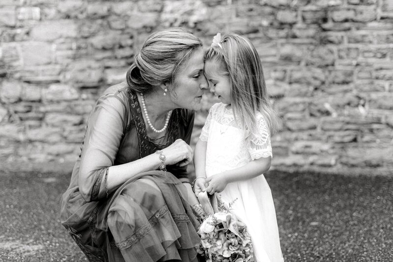 Flower girl and mother of bride eskimo kiss at Staunton VA wedding