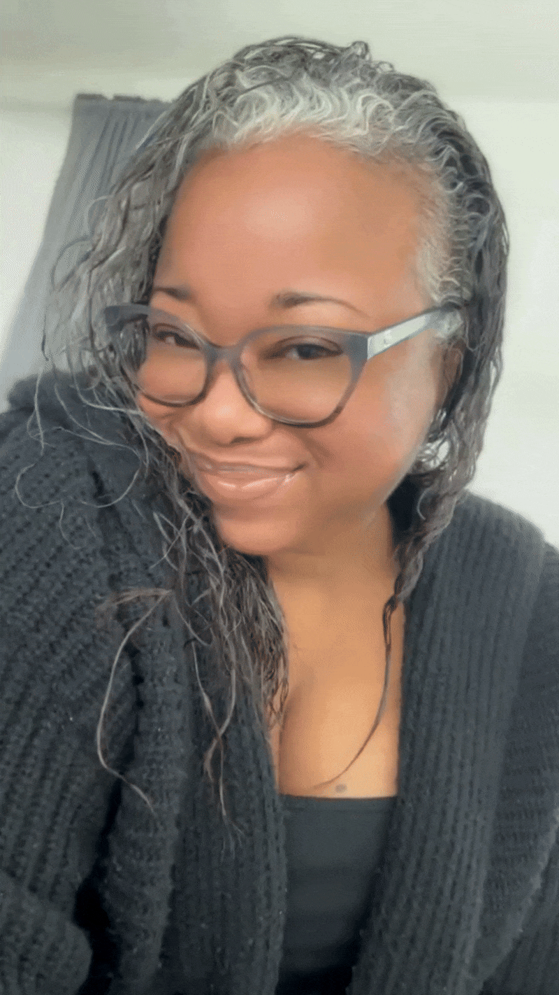 Letitia Hopkins smiling confidently, radiating Main Character Energy with self-love, empowerment, and confidence, inviting women to embody their most magnetic, aligned identity.