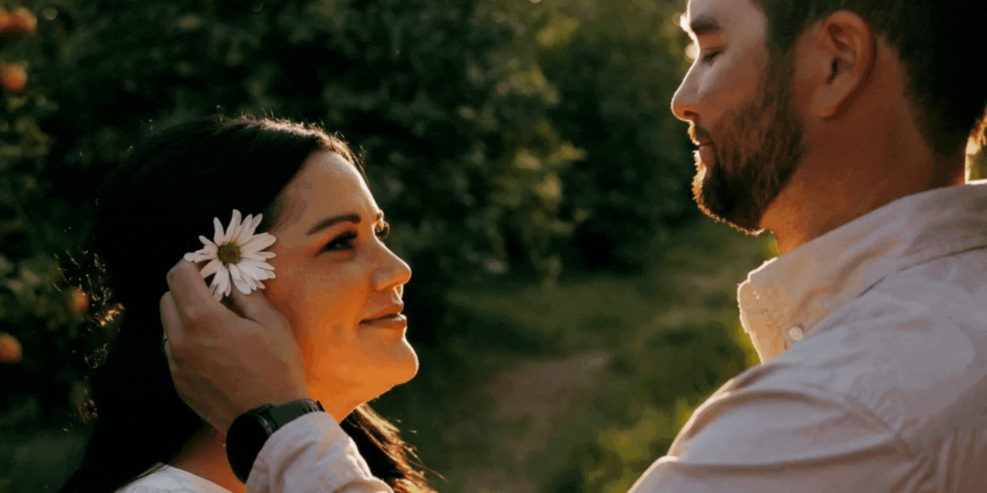husband kissing wife moving image