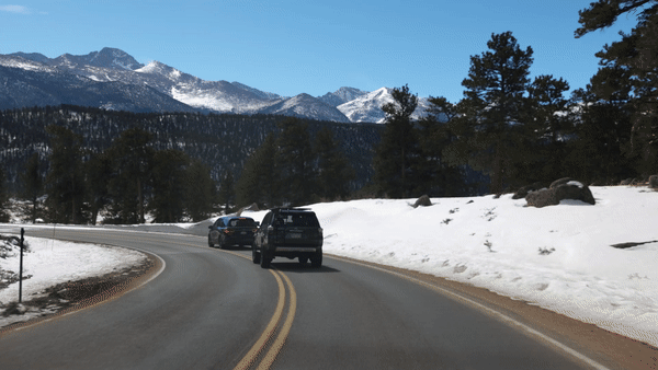 Driving through rocky mountain national park and drone footage