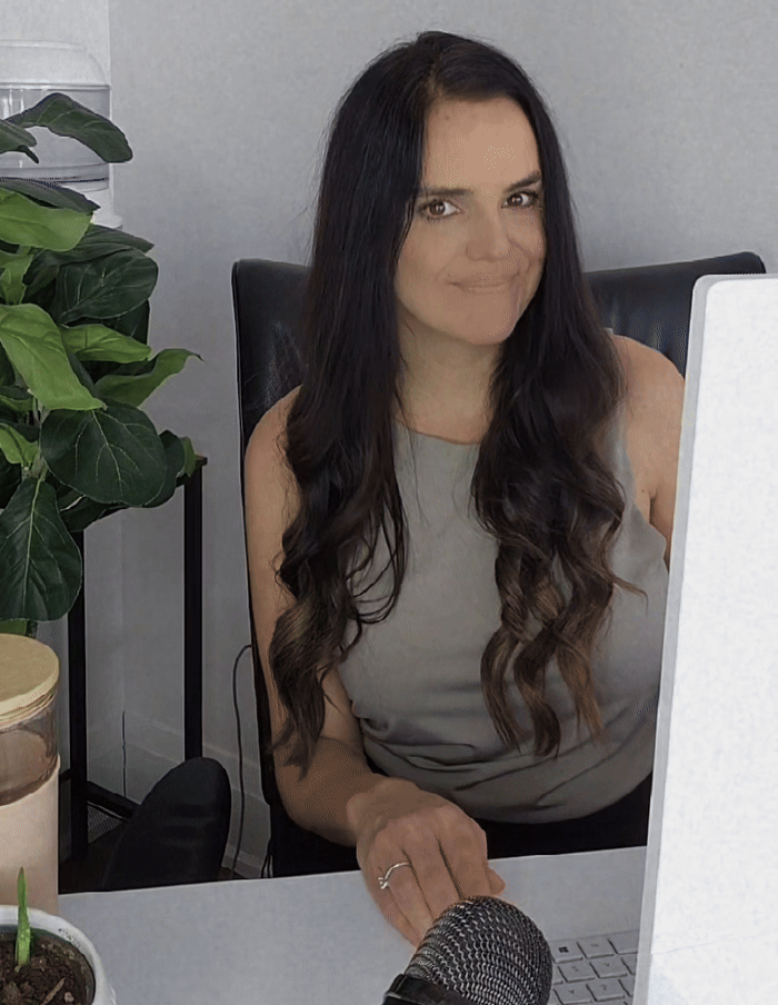 Girl working on computer at desk | GIF