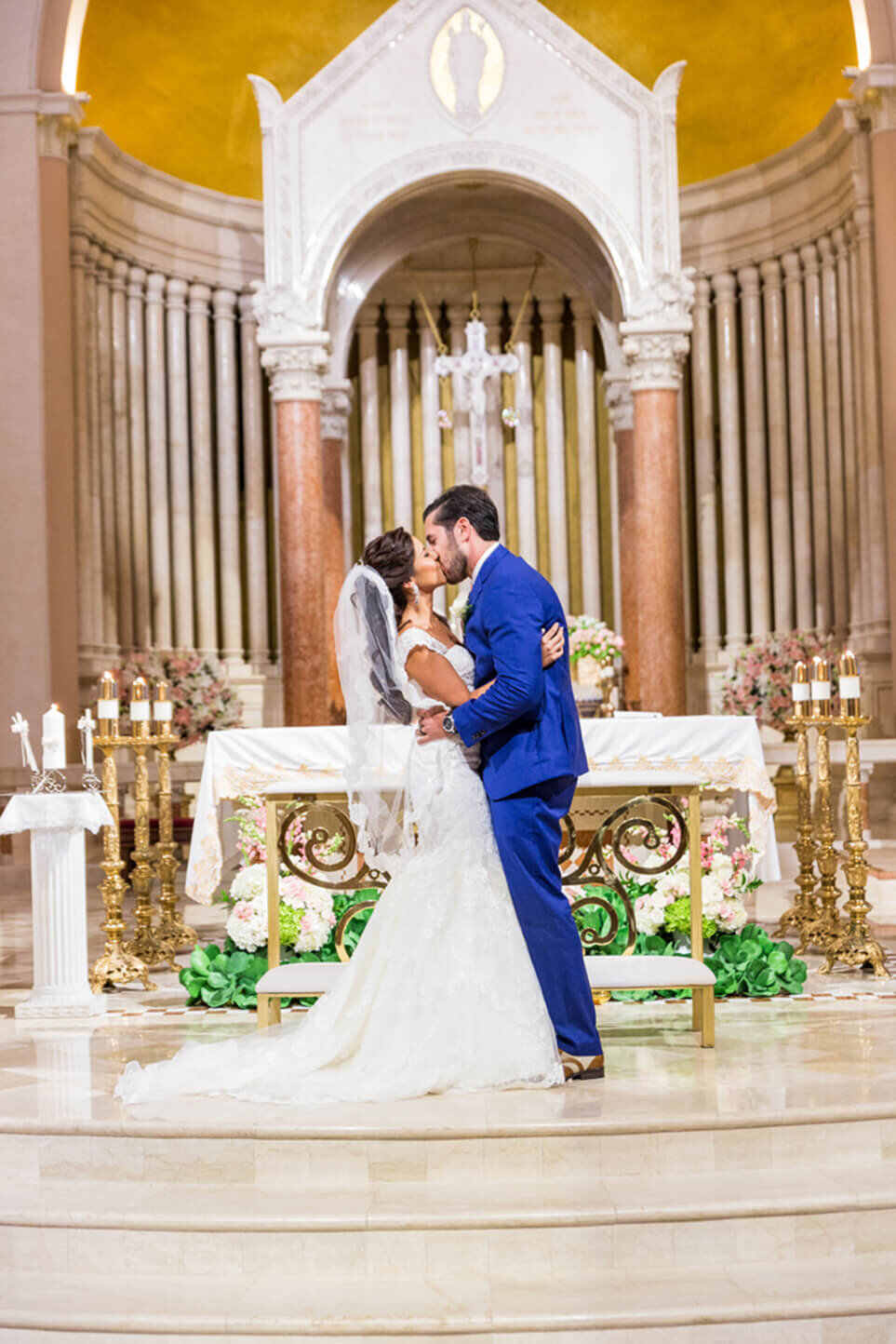 Andrea and Edward first kiss as husband and wife at St, Patrick Catholic Church on Miami Beach Florida.