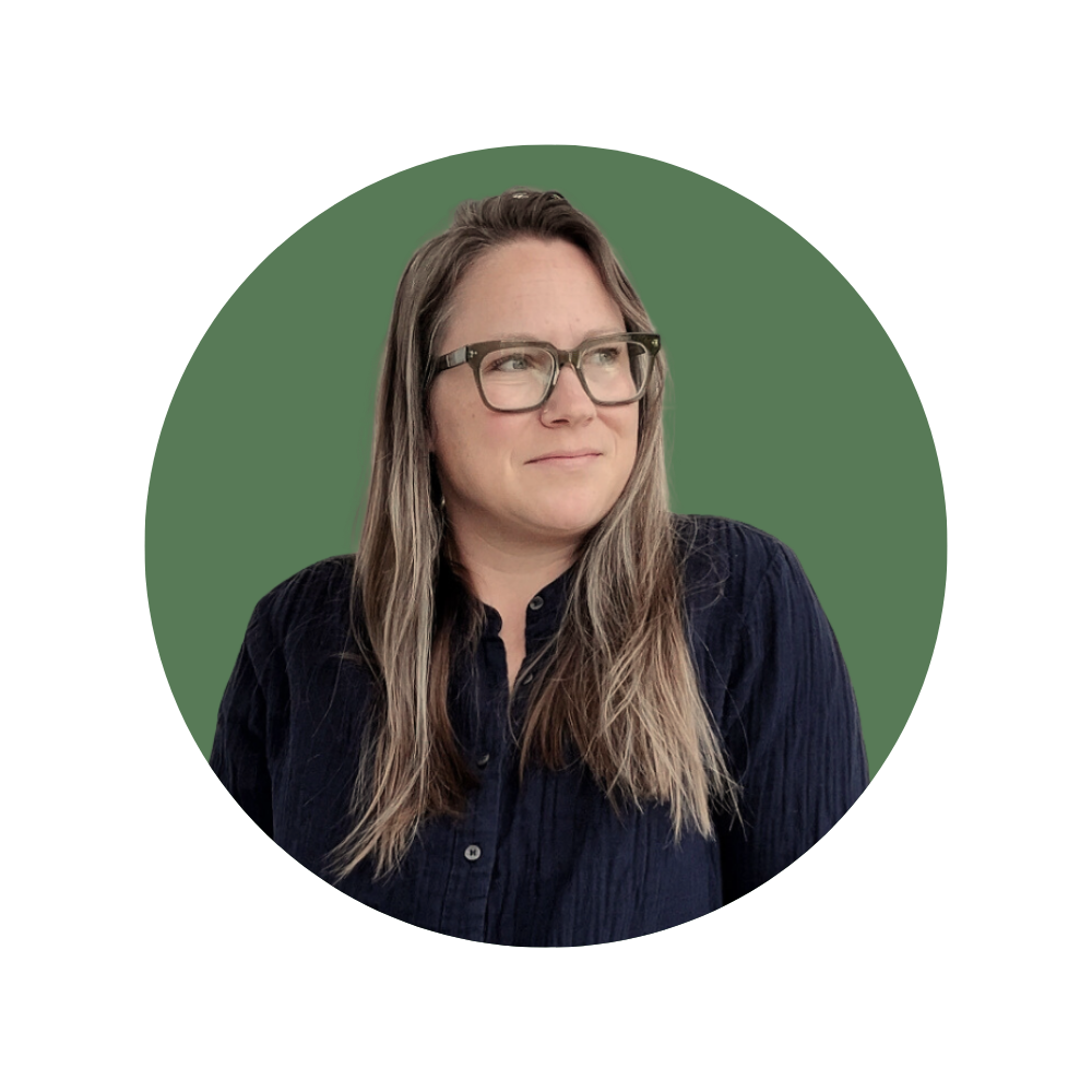 Becky L., a Web Designer Library member, wearing glasses and a dark navy button-up shirt.