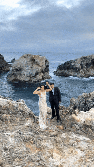 couple cheering in big sur after elopement