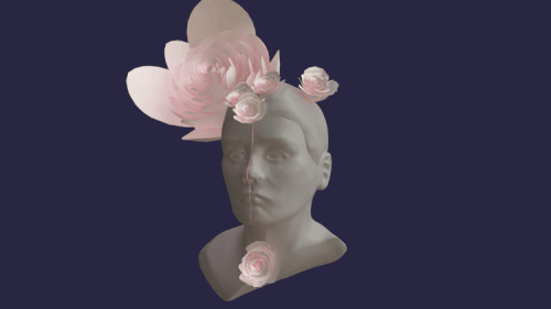 statue of face comes apart to show flowers inside