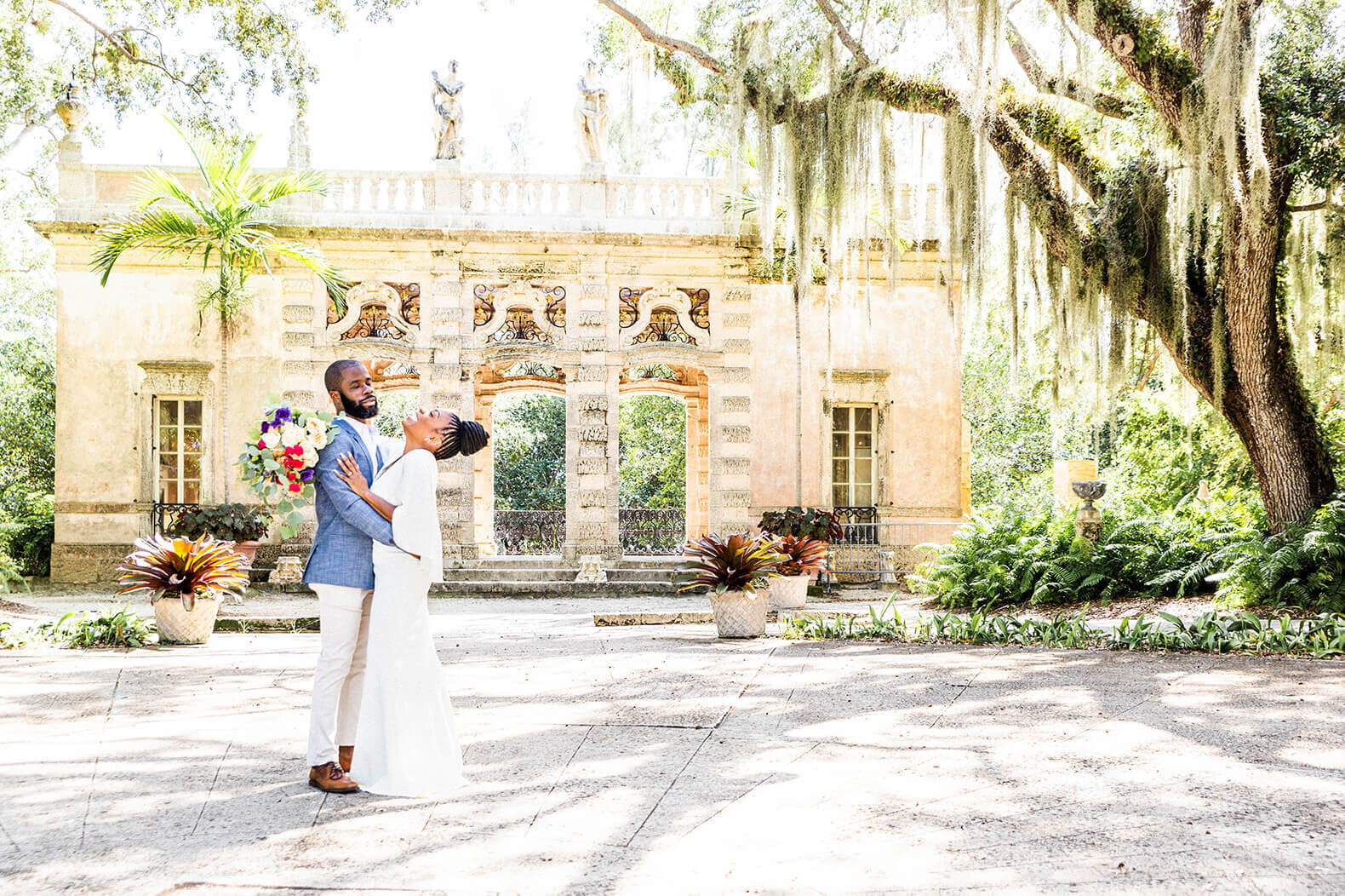 Newlywed couple's photo at Vizcaya Museum and Gardens by Wedding Photography Miami