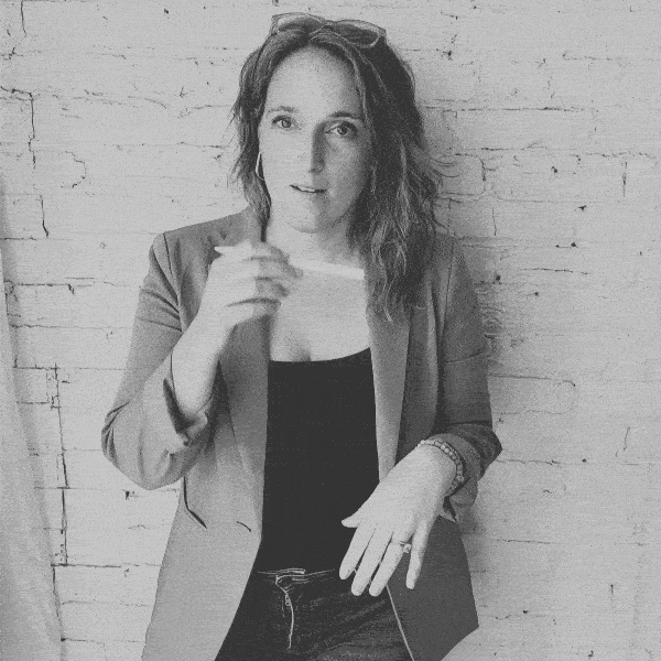 Julie setting computer down on chair 